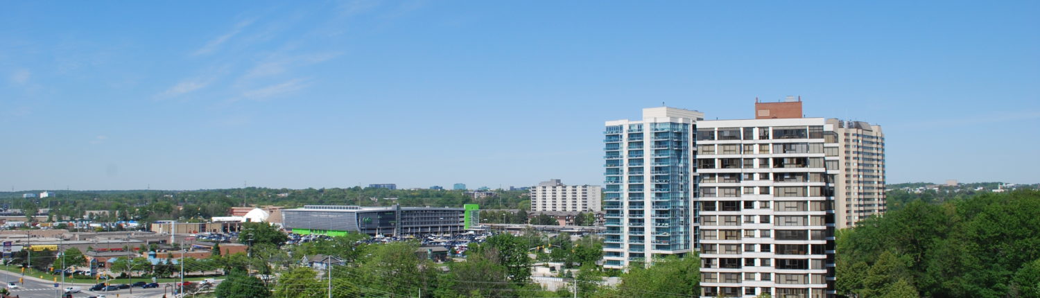 A view of of the Clarkson Go Train station and condo buildings