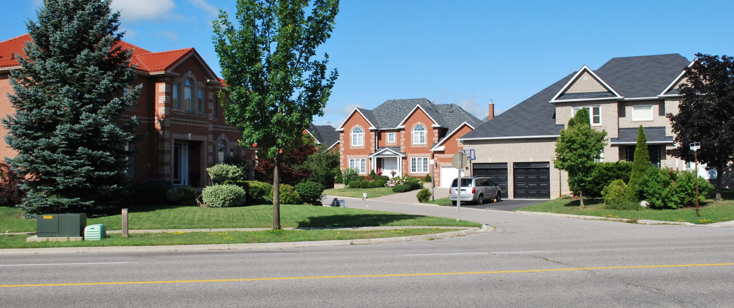 a street view of detached houses in Lisgar Mississauga