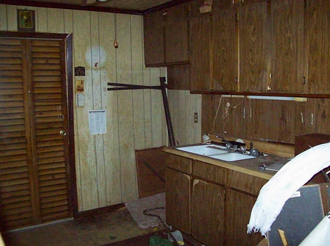 "The imported wood paneling was custom stained with nicotine extract." - www.uglyhouseohtos.com