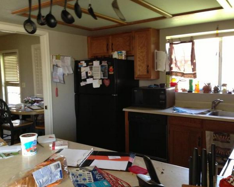 "Clutter in a Peoria, Arizona kitchen. Plus a flyswatter and a bingo game card." - www.uglyhousephotos.com