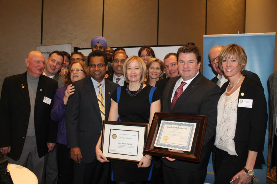 The Rotary Club of Meadowvale getting apicture with Laureen Harper. Who's that guy second from the left?