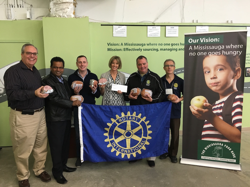 My club, the Rotary Club of Mississauga Meadowvale visiting the Food Bank for the Holiday Ham drive